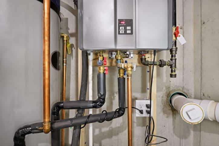 A tankless water heater connected to recirculator.